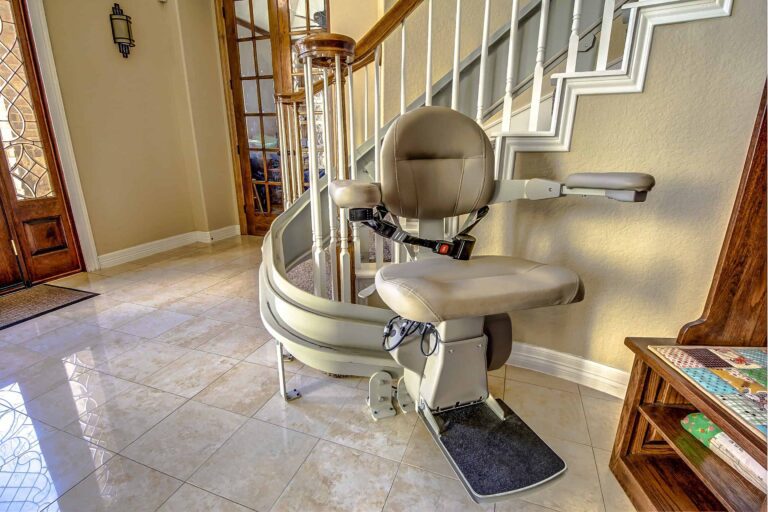 Bruno stairlift chair at bottom of stairs